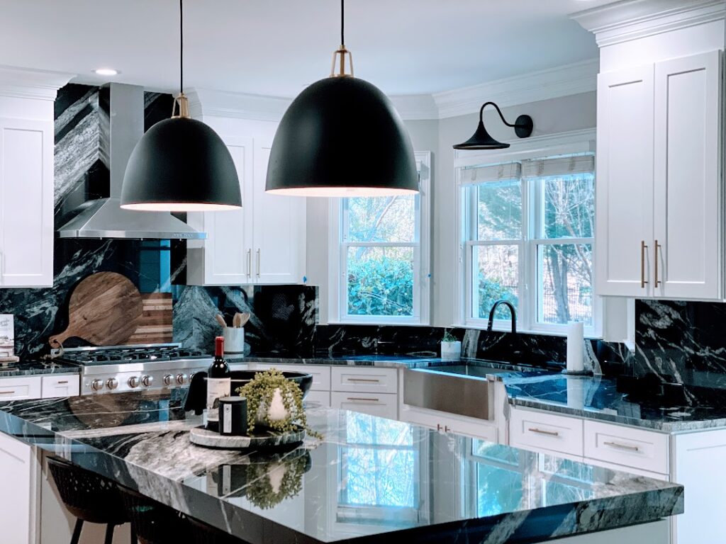 Luxury Kitchen with White Cabinets, Black granite & Gold Accents
